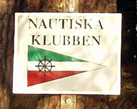 Nautiska klubbens flagga på tavla